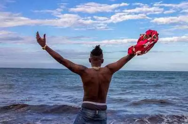Checkout New Photos Of Rapper Ycee Having Fun In Tanzanian Beach